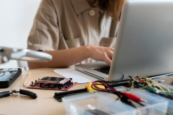 young-woman-working-her-workshop-creative-invention